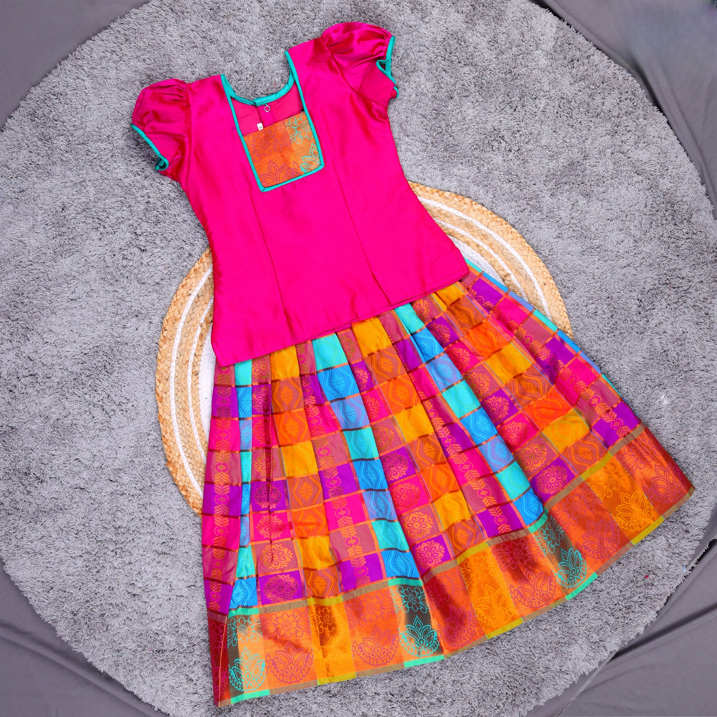 Traditional Pink Cotton Pattu Pavadai Sattai with Multicolor Checked Skirt